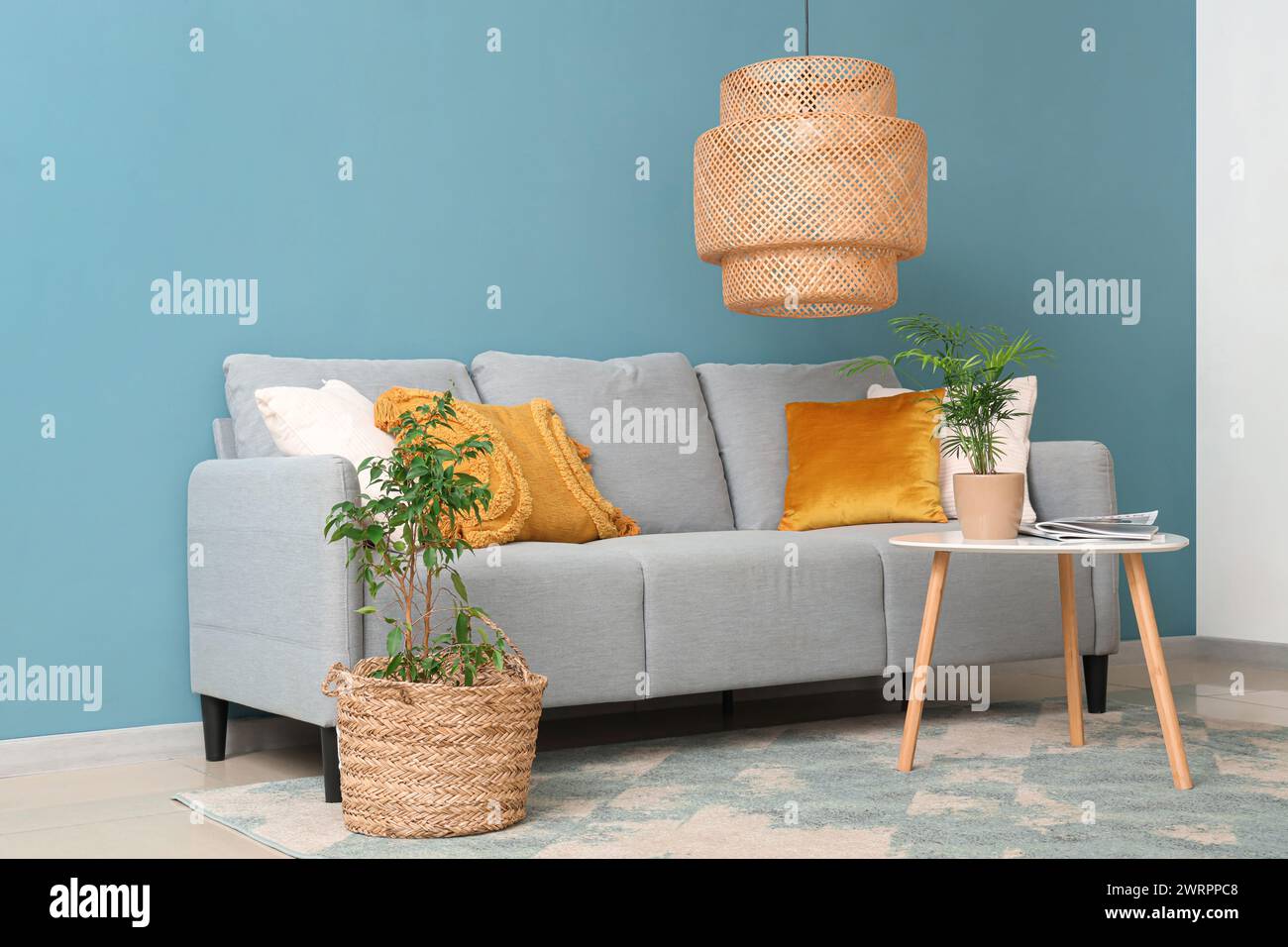 Interior of living room with sofa, lamp and coffee table Stock Photo ...