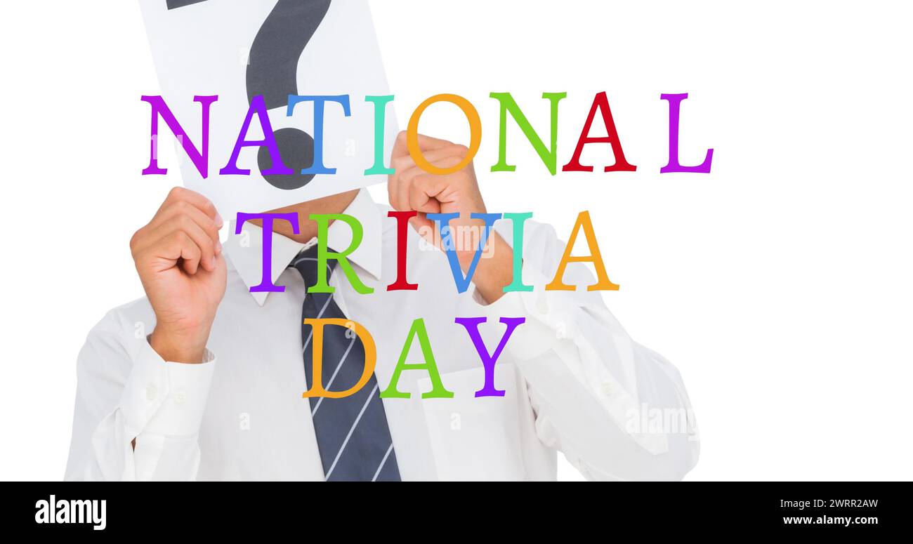 Image of national trivia day text over caucasian businessman with question mark Stock Photo