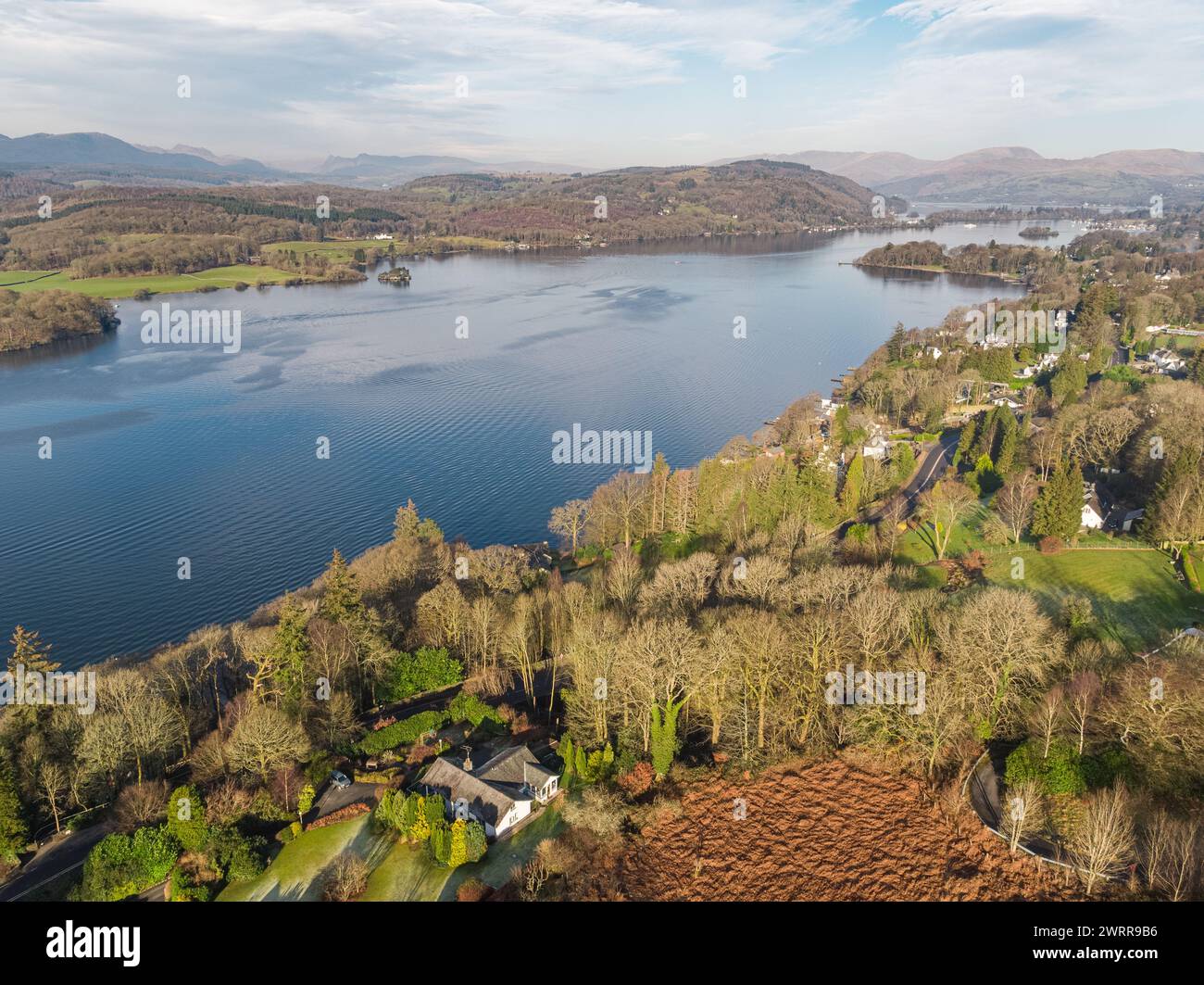 Aerial photograph of Lake Windermere, Cumbria, UK with the Lake District's hills and mountains in the distance Stock Photo