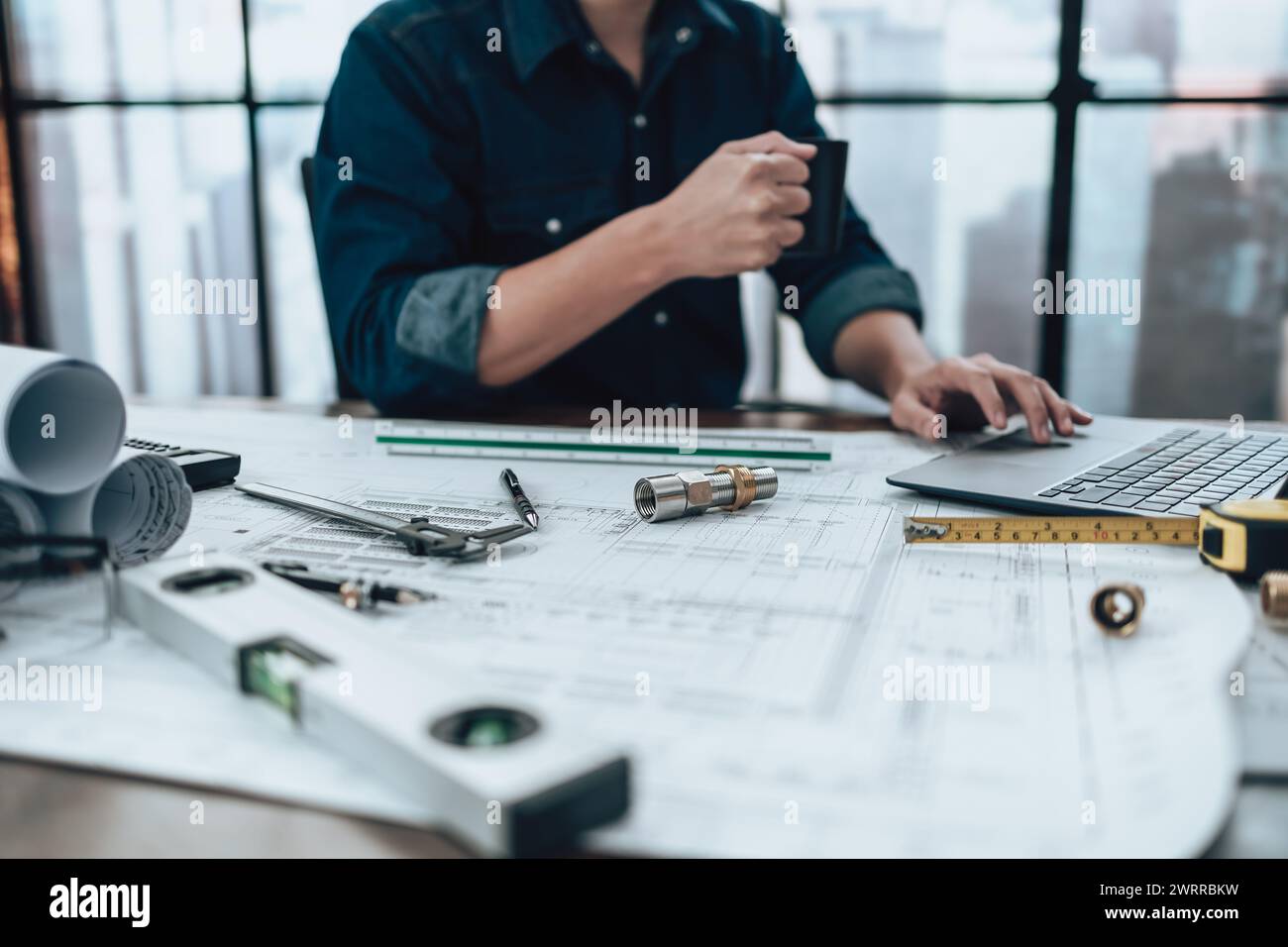 Joint pipe with drawings on the office desk and Calculator, triangle ...