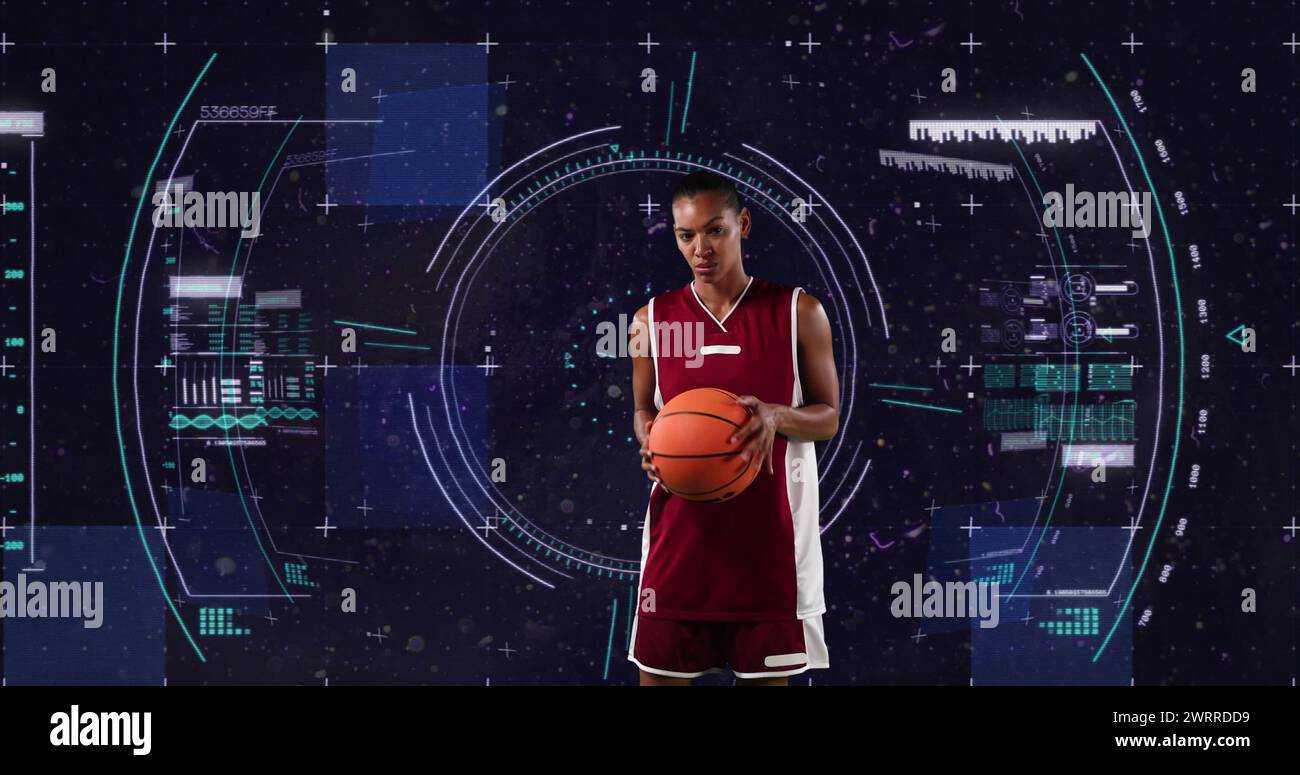 Image of african american female basketball player over scope scanning on black background Stock Photo