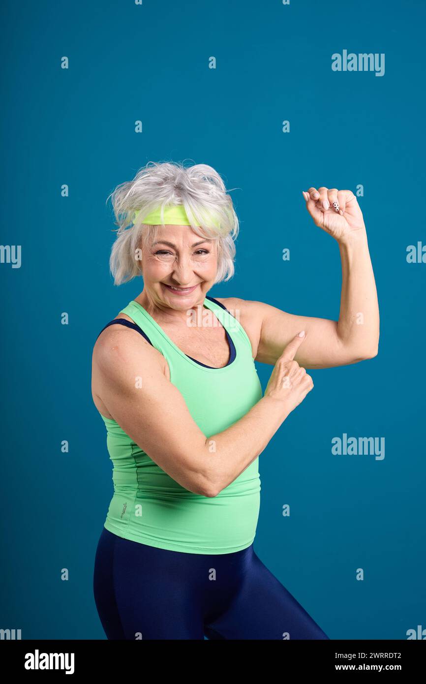 Energetic Senior Lady Enjoying Her Workout Stock Photo