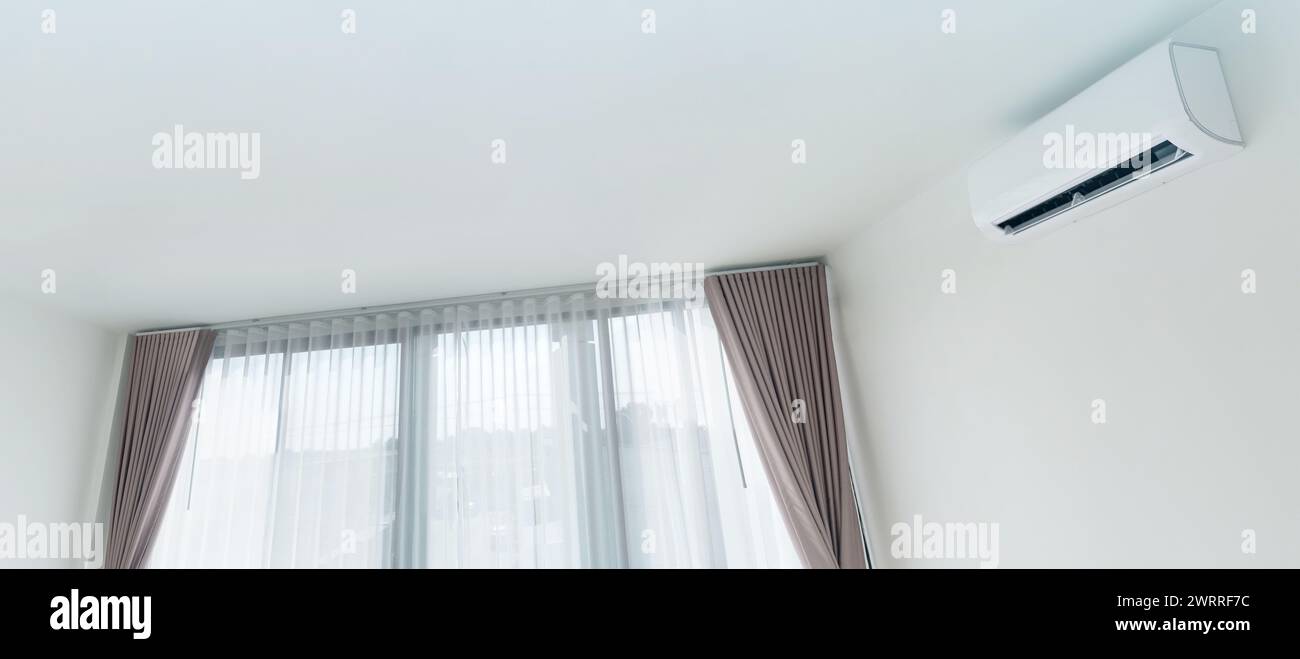 Air conditioner on white wall background Stock Photo - Alamy