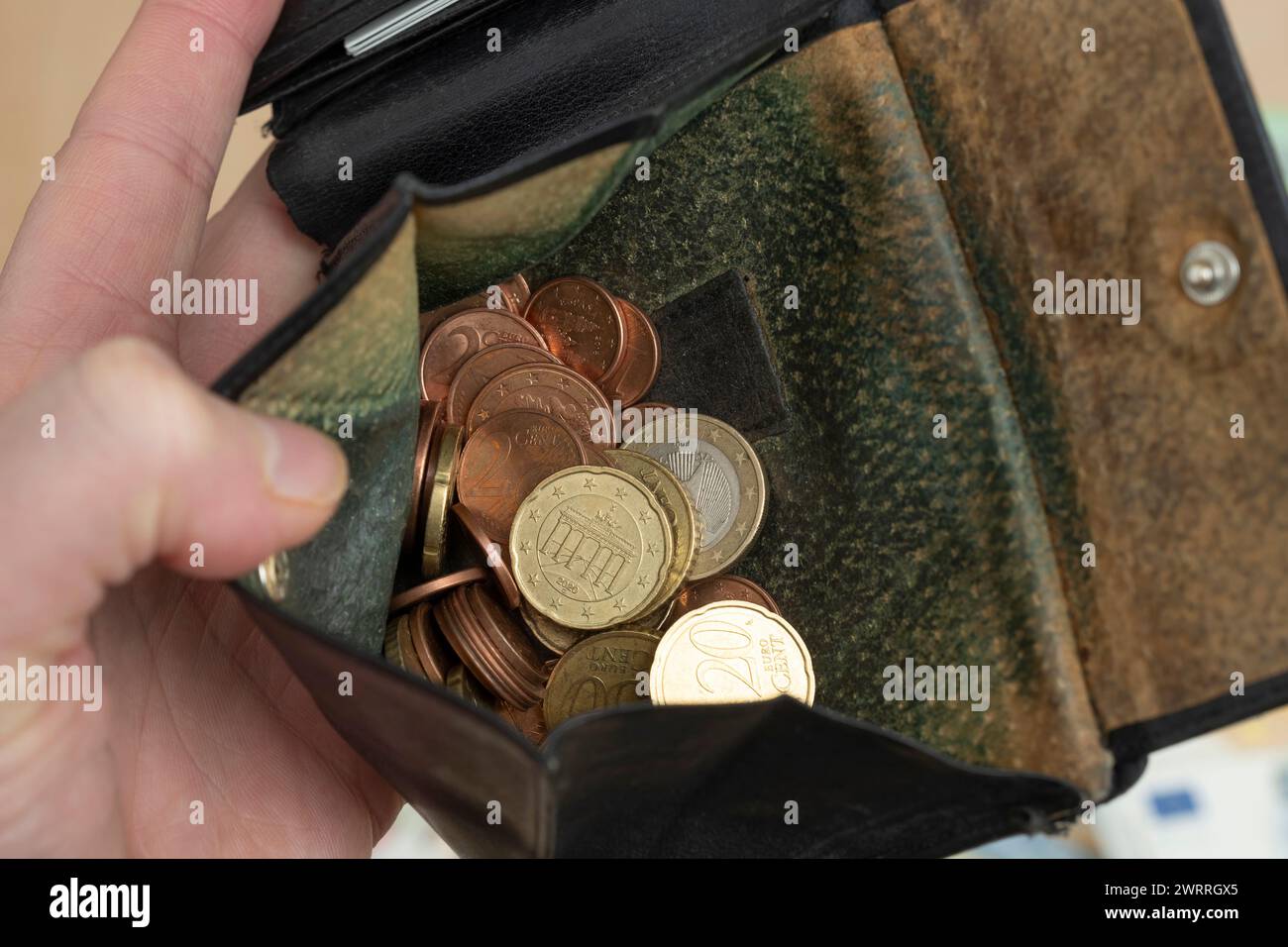 Opened old wallet with euro coins Stock Photo