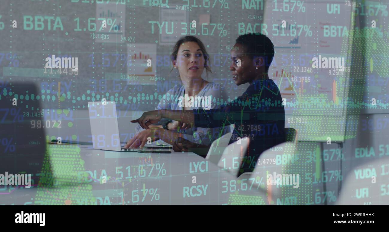 Image of financial data processing over business people in image Stock Photo
