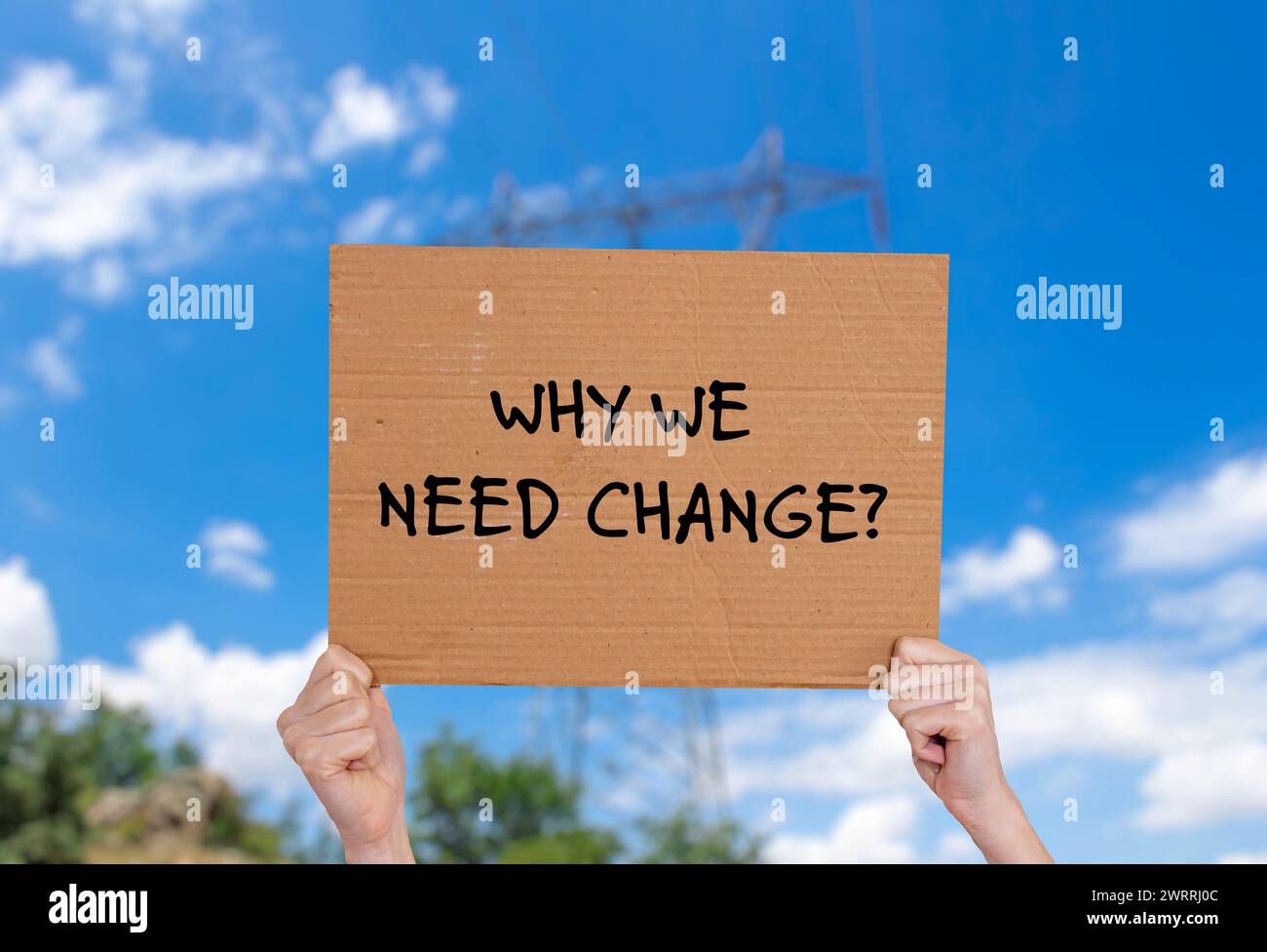 Why we need change words written on cardboard sign. Conceptual symbol. Copy space. Stock Photo