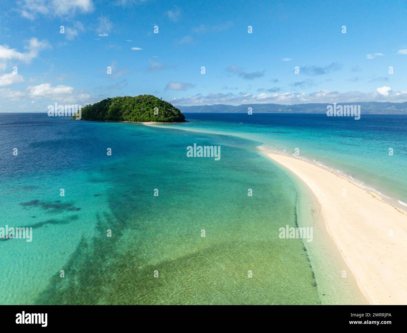 Waves in sandbar and turquoise sea water. Island and sandbar in Romblon ...