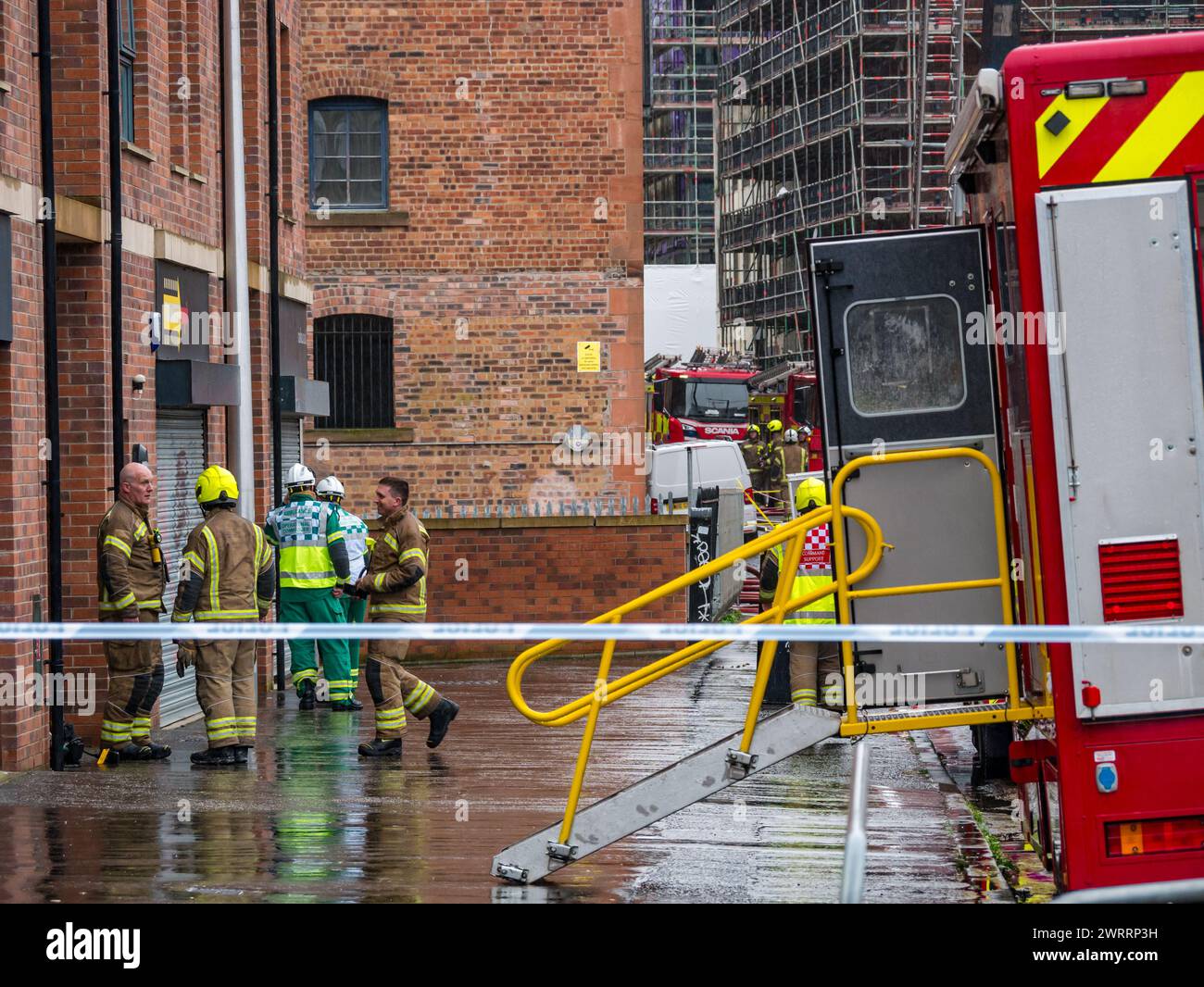 Edinburgh, Scotland, UK, 14th March 2024. Fire at block of flats in Bonnington: a major fire broke out in the converted bond warehouse. Emergency services and vehicles are in attendance including paramedics and firefighters. Credit: Sally Anderson/Alamy Live News Stock Photo