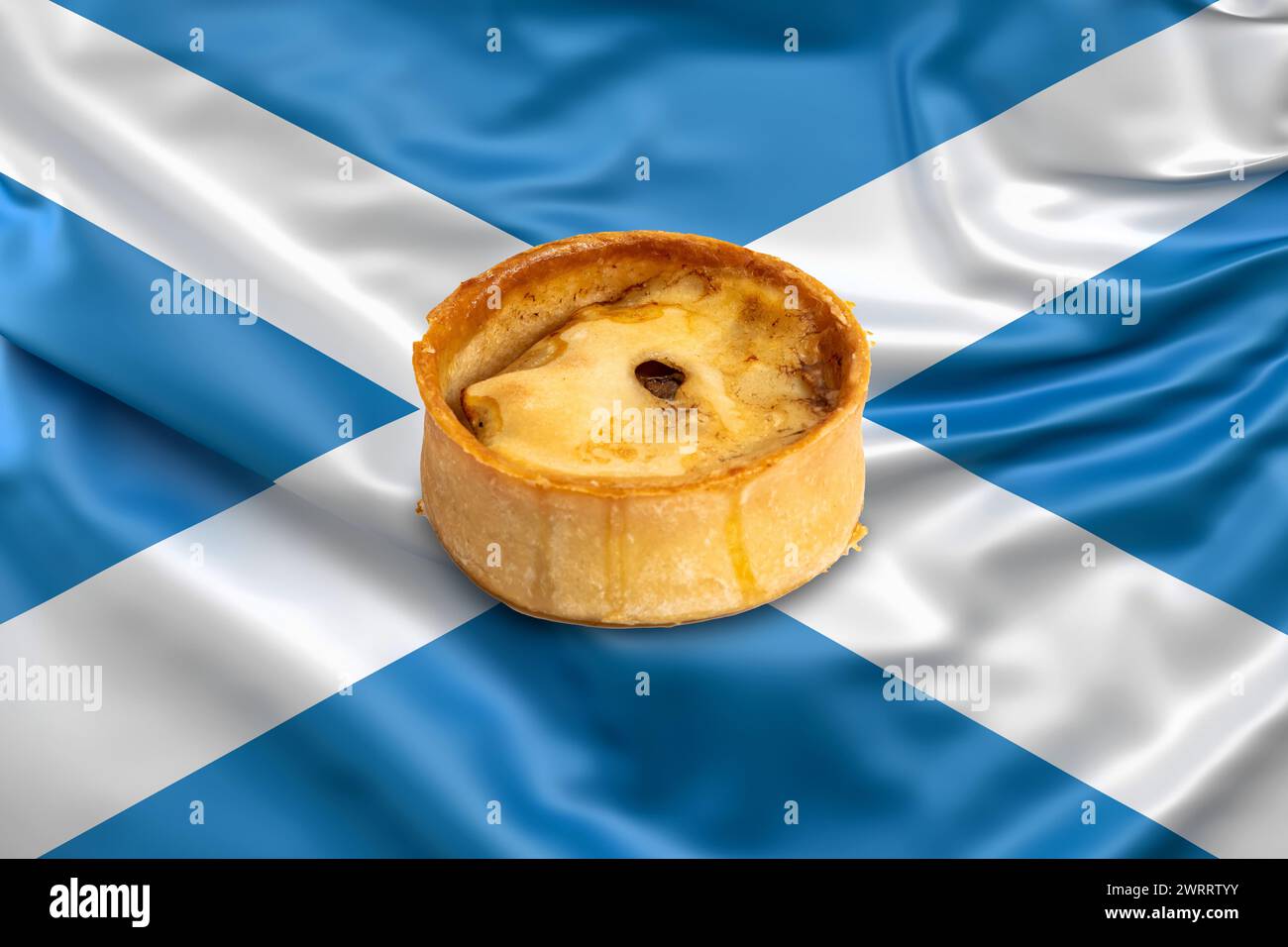 The famous bakery product of a Scotch pie from Scotland. Pictured on a ...