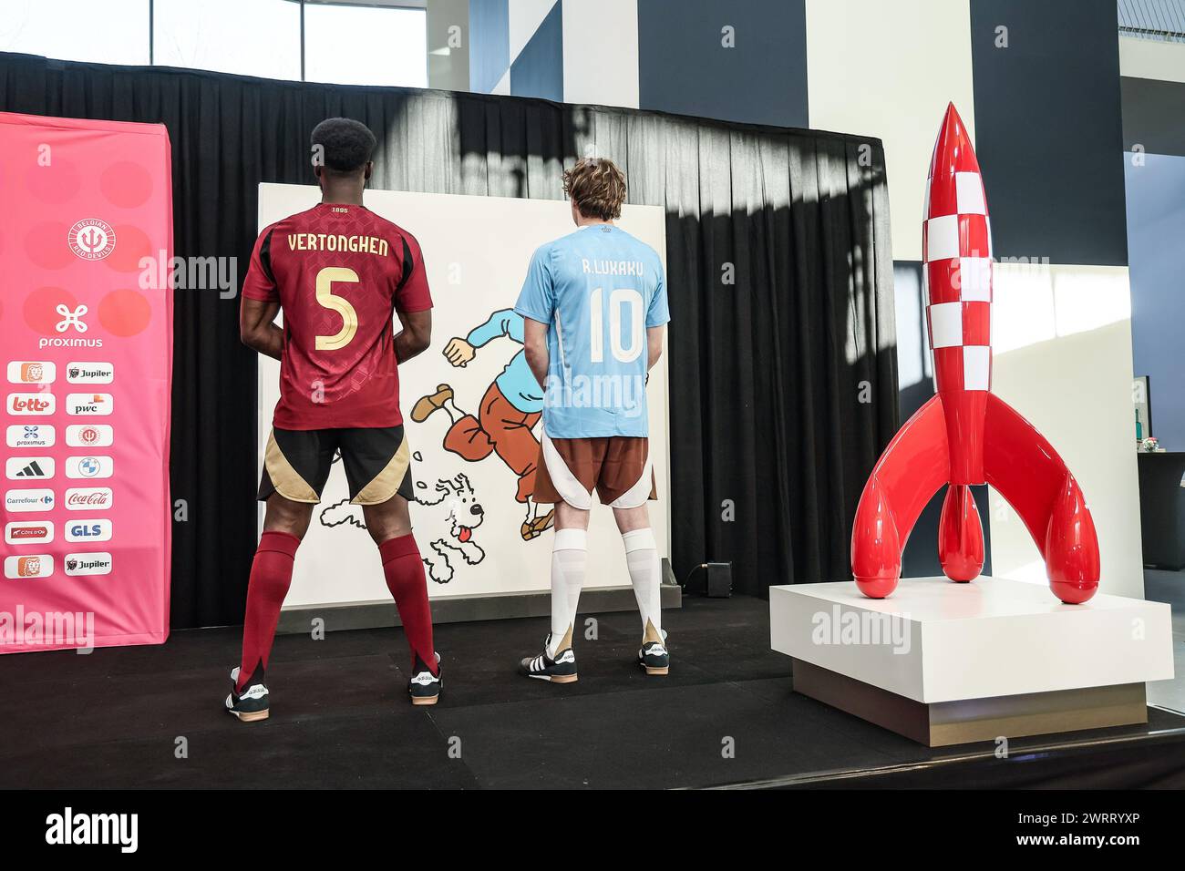 Louvain La Neuve, Belgium. 14th Mar, 2024. Two models show the home and away outfits, during a press conference of Belgian national soccer team Red Devils to present the new shirts for the UEFA Euro 2024 European Championship, Thursday 14 March 2024, at the Musee Herge in Louvain-la-Neuve. The new outfit, with light blue shirt with white collar, combined with brown shorts, refers to the iconic outfit of Kuifje - Tintin, the world-famous Belgian reporter-adventurer from the Herge comic books. BELGA PHOTO BRUNO FAHY Credit: Belga News Agency/Alamy Live News Stock Photo
