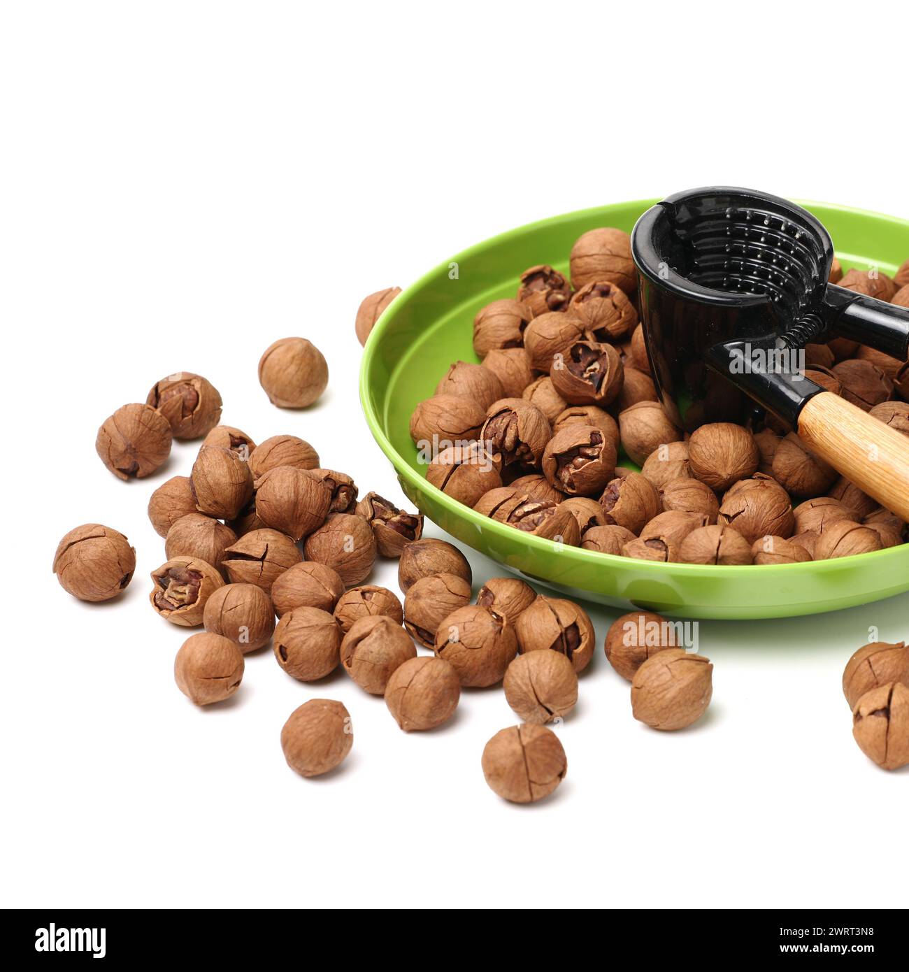 shagbark hickory nuts on white background Stock Photo