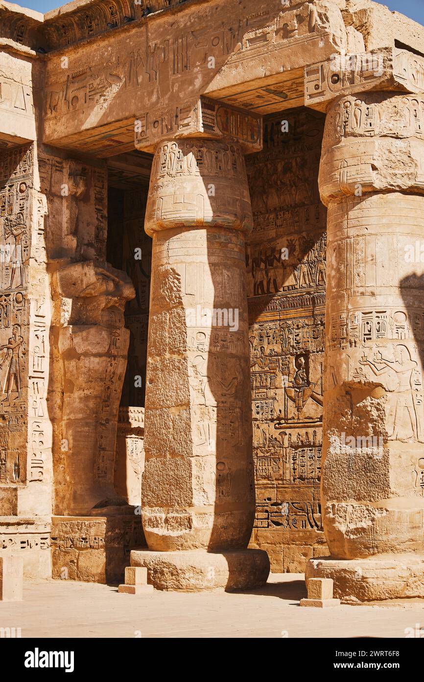 Columns with Egyptian hieroglyphs and ancient symbols. Famous Egyptian ...