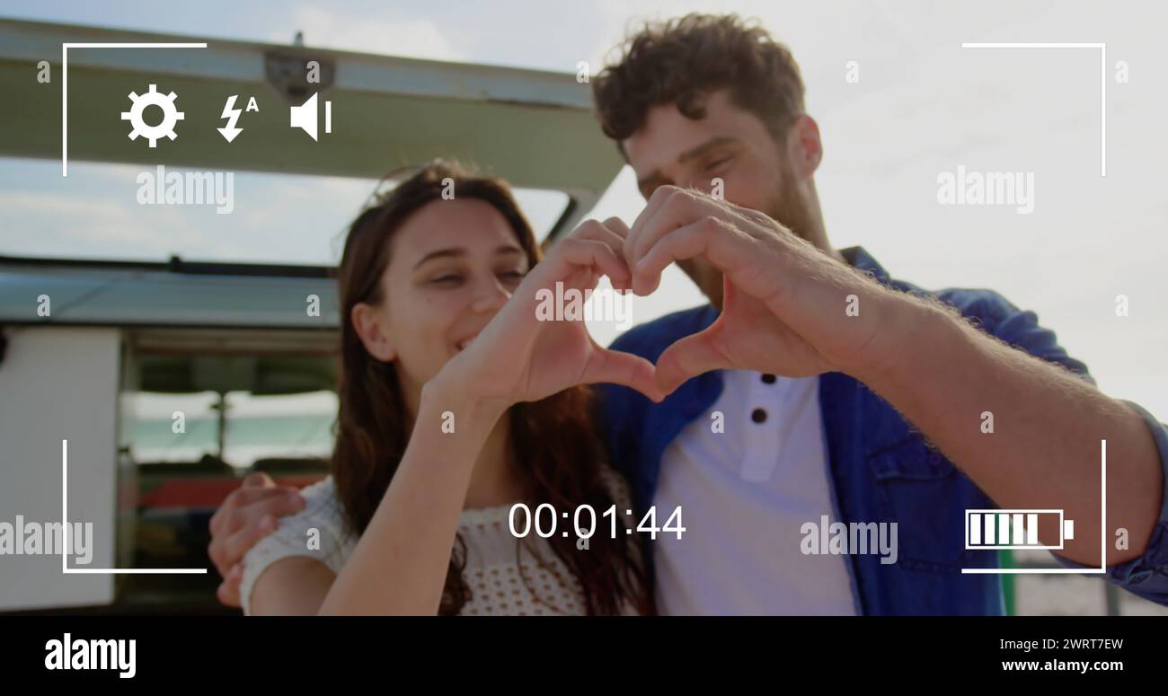 Young couple captured on a digital camera screen in 4k record mode. Stock Photo