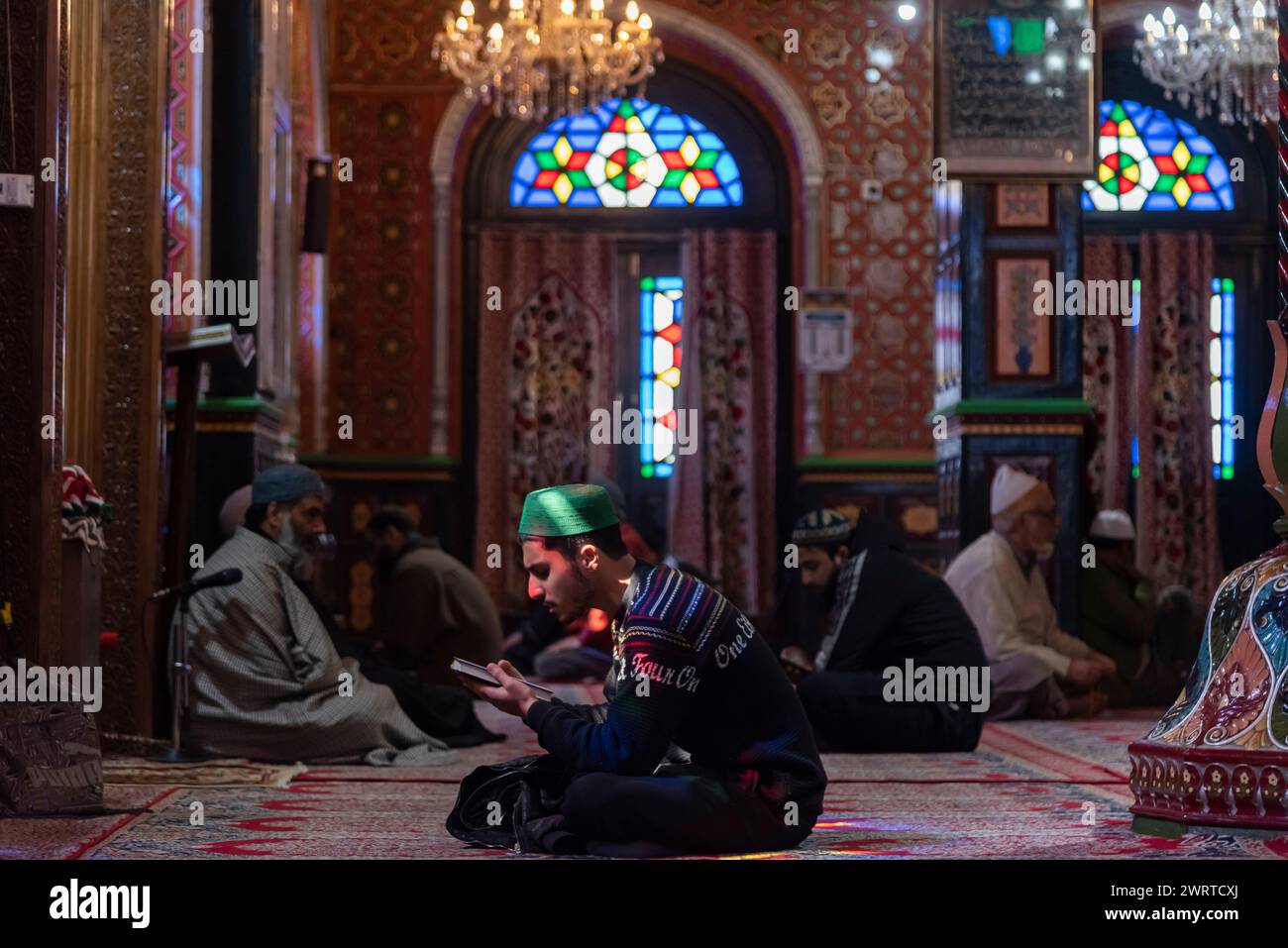 Srinagar, India. 14th Mar, 2024. A Kashmiri Muslim man prays inside a ...