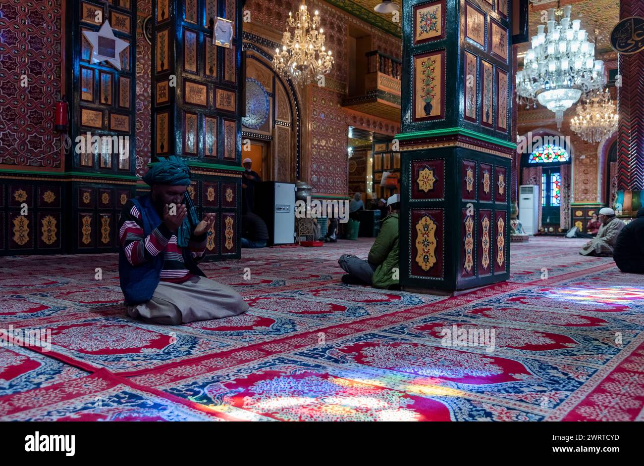 Srinagar, India. 14th Mar, 2024. A Kashmiri Muslim man prays inside a ...