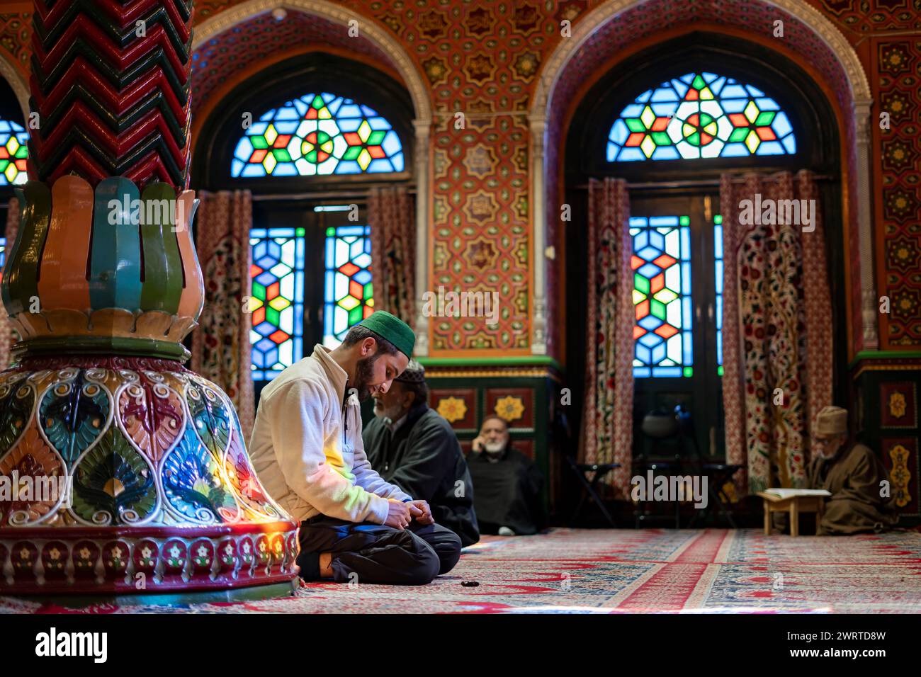Srinagar, India. 14th Mar, 2024. A Kashmiri Muslim man offers prayers ...