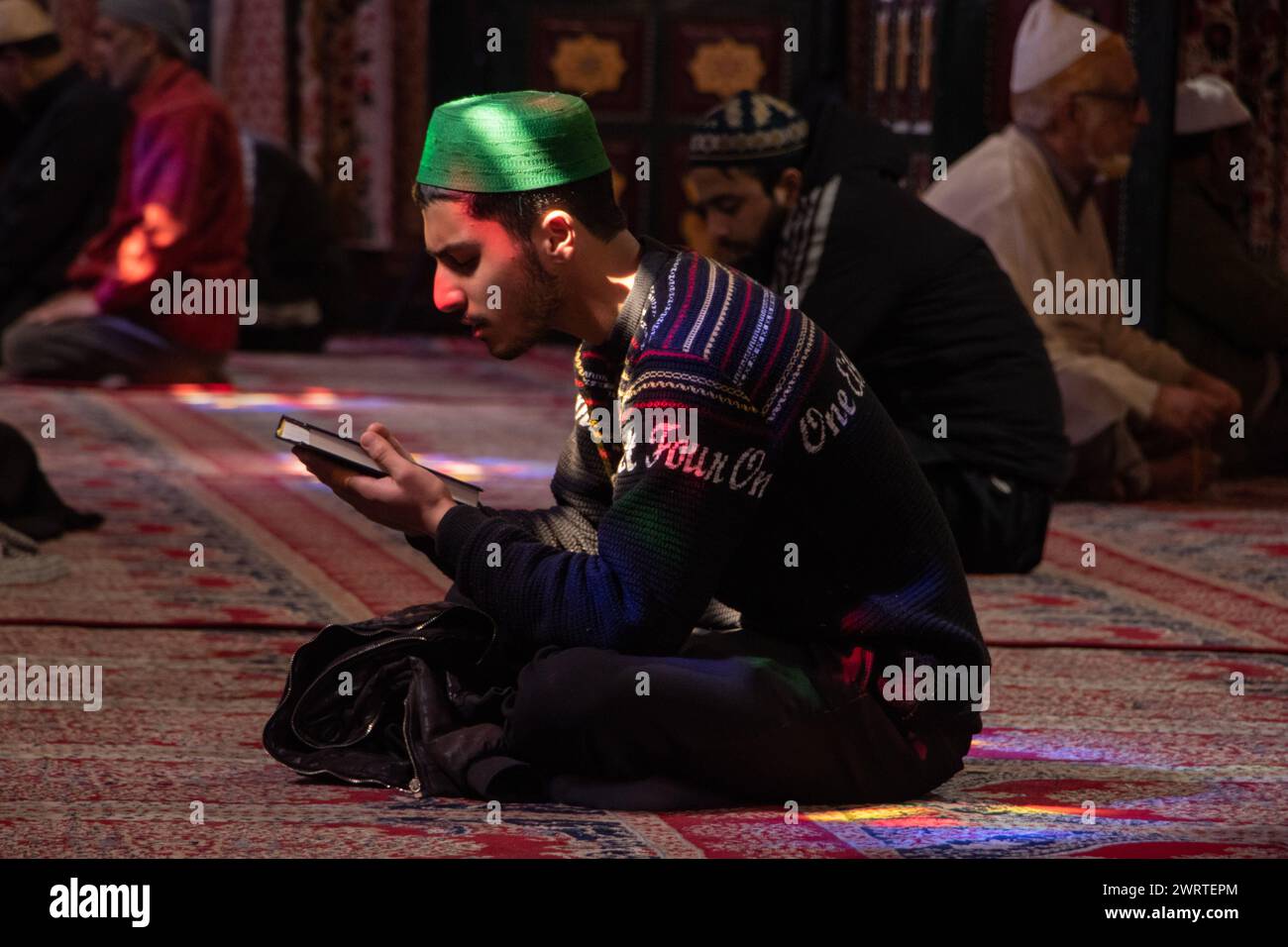 Srinagar, Kashmir, India. 14th Mar, 2024. A Kashmiri Muslim is seen ...