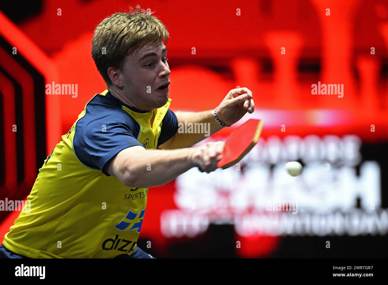 Singapore. 14th Mar, 2024. Truls Moregard of Sweden hits a return