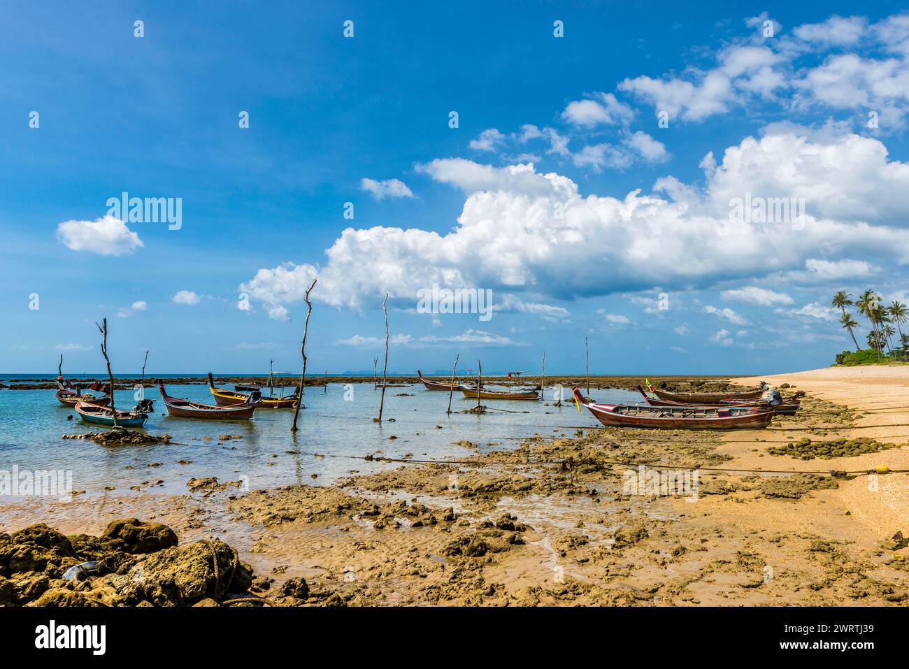 Fishing boats at low tide, longtail boat, water, sea, ocean, coast, summer, daytime, Andaman Sea, break, tranquillity, exotic, tradition Stock Photo