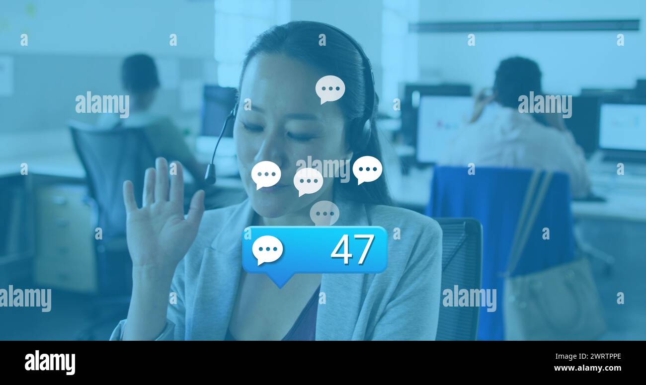 Image of social media reactions over asian woman in office having call ...