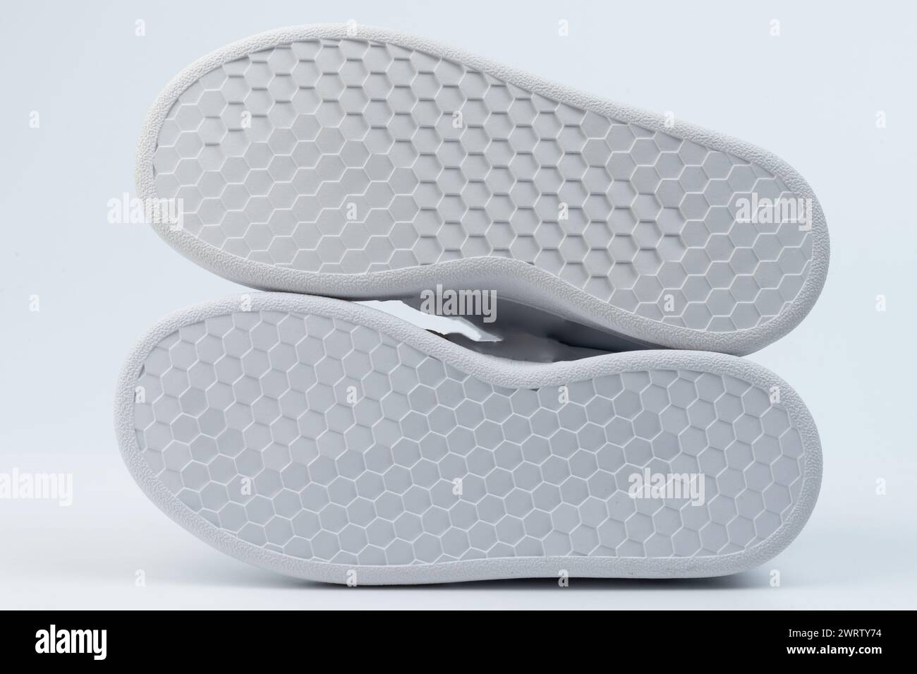 White rubber shoe bottom sole isolated on studio background Stock Photo