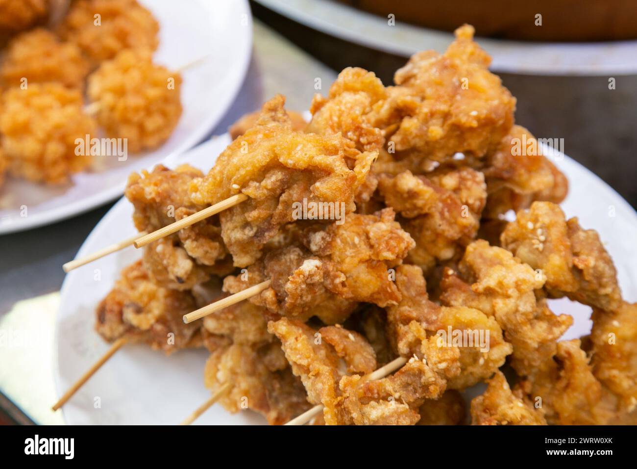 Chinese fried chicken balls in a street food stand in Kobe, Japan. Stock Photo