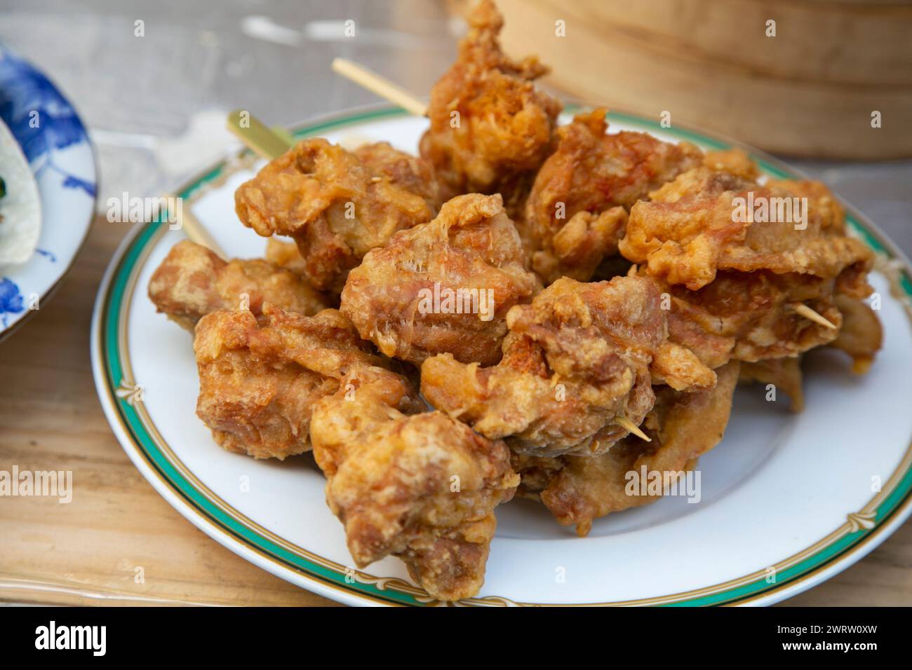 Chinese fried chicken balls in a street food stand in Kobe, Japan. Stock Photo