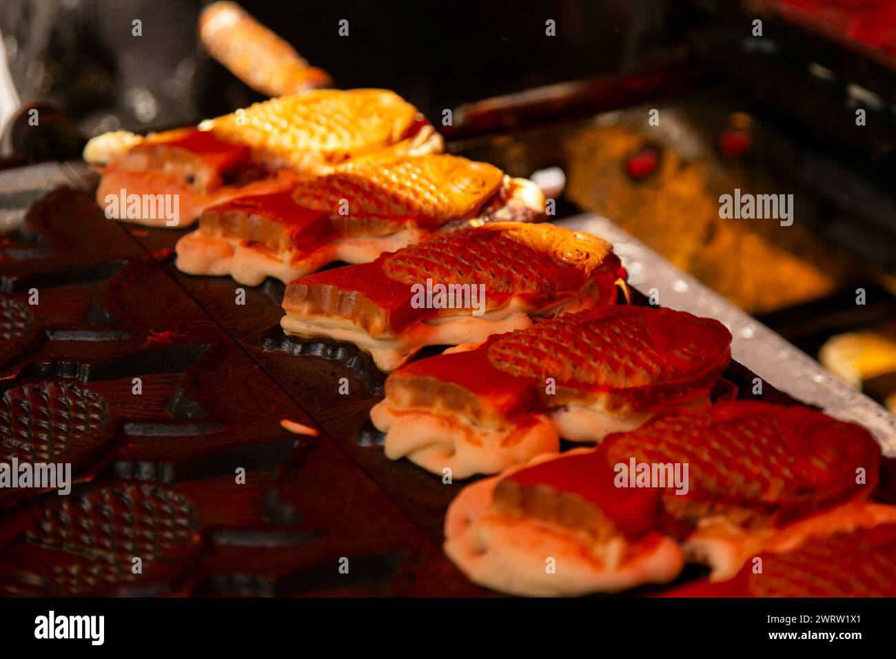 Taiyaki is a Japanese fish-shaped cake, commonly sold as street food ...