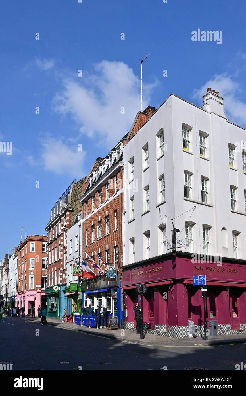 Buildings with shops, restaurants and public house in Dean Street (corner of Romilly Street), Soho, London, England, UK . Stock Photo