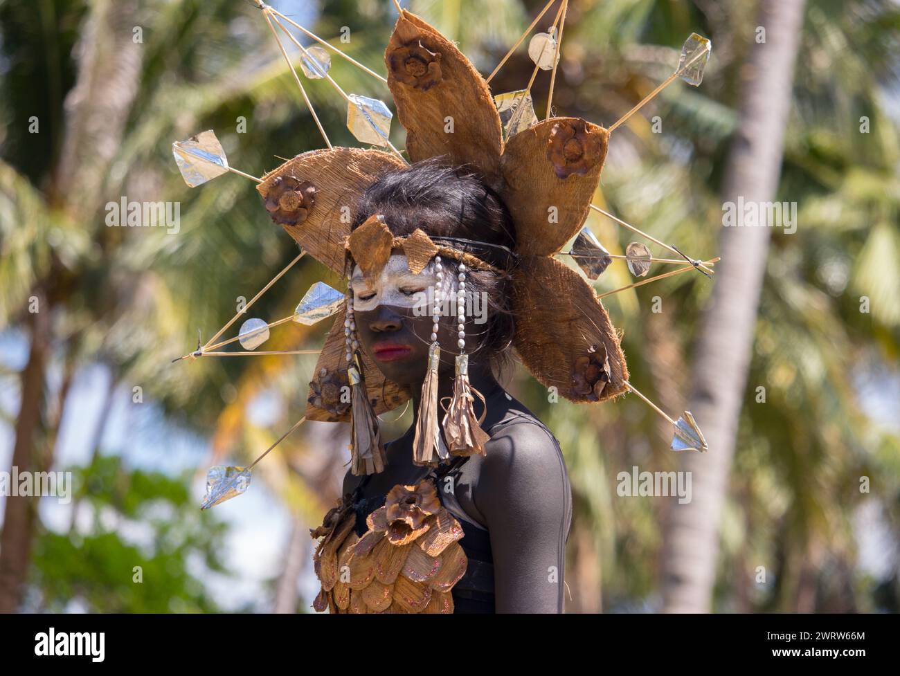 Philippines: unknown asian girl with painted face and ethnic costume while performance.Asian tribal girl with exotic makeup. Entertainment concept. Stock Photo