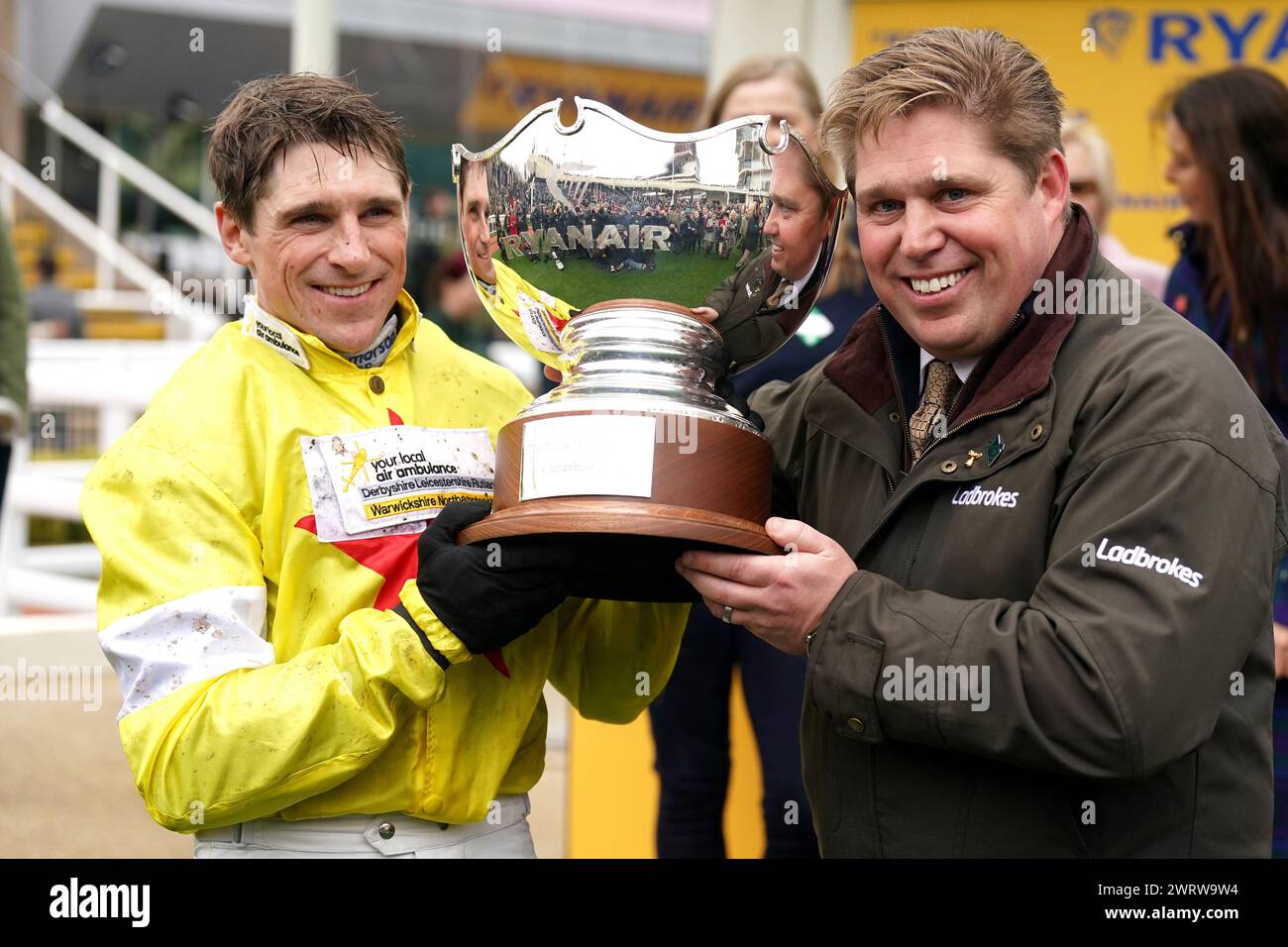 Jockey Harry Skelton (left) and trainer Dan Skelton celebrate with the