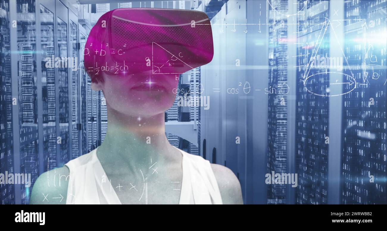Woman in VR headset interacts with digital math equations in a server ...