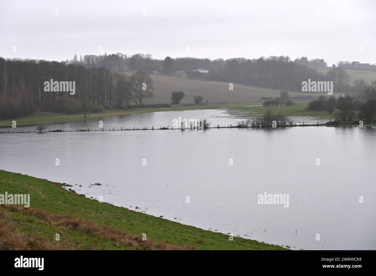 Flooded fields close to the River Windrush as it makes its way from the Oxfordshire town of Burford towards the hamlet of Widford Stock Photo