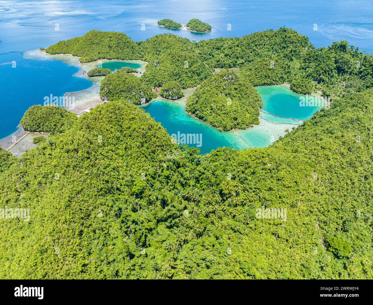 Birds eye view of tropical island with beautiful islets and turquoise lagoons. Mindanao, Philippines. Stock Photo