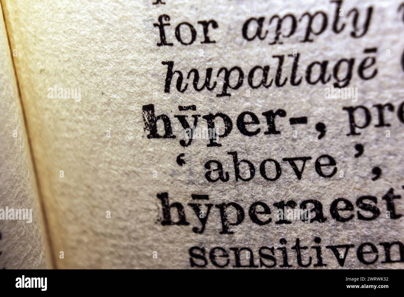 Word hyper on dictionary page, macro close-up Stock Photo