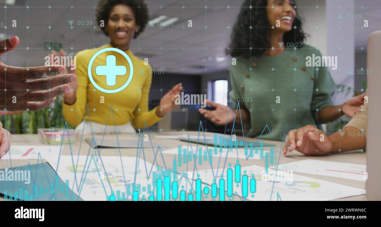 Image of graphs, numbers, icons, diverse coworkers discussing and putting hands together Stock Photo