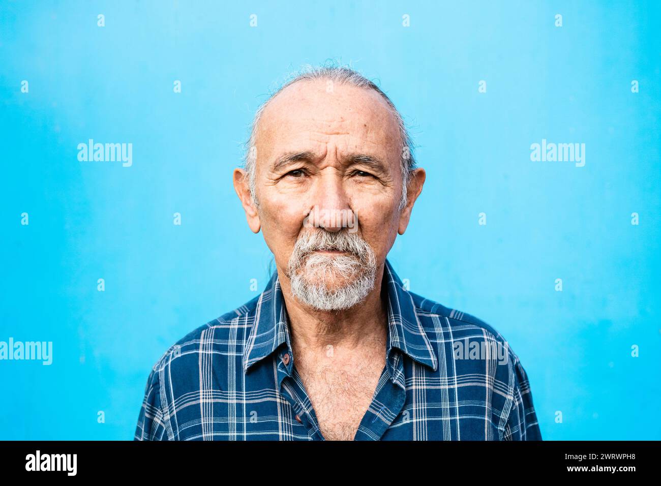 Portrait of a Senior man looking into the camera - Elderly people lifestyle concept Stock Photo