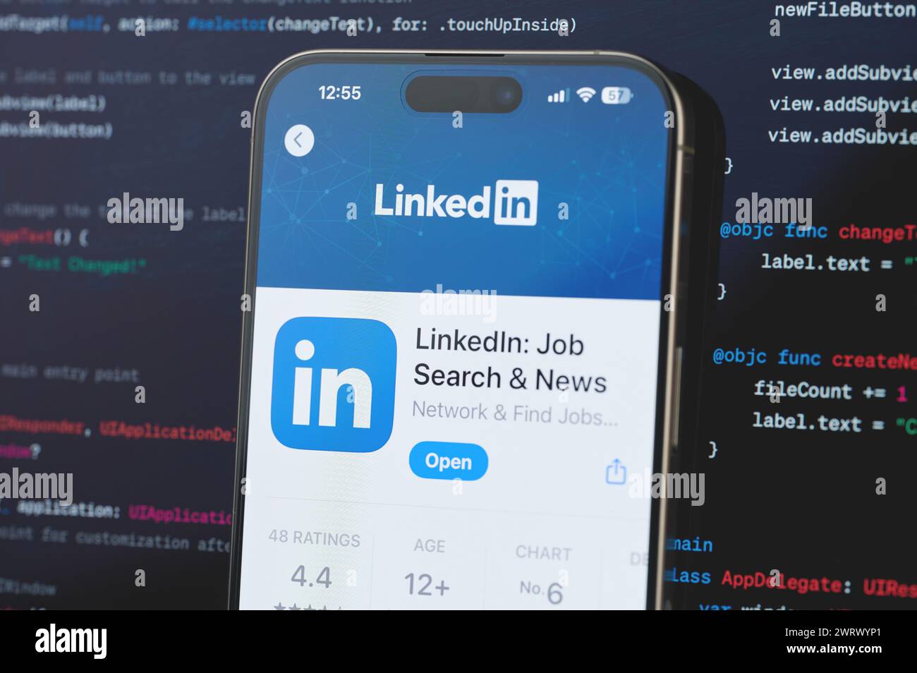 New York, USA - February 23, 2024: Linkedin on iphone screen in blurred ...