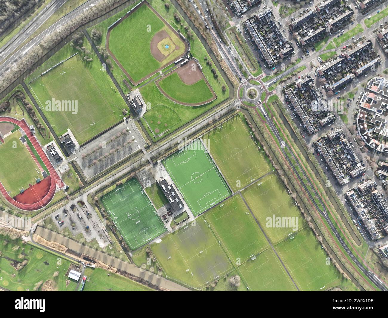 Amateur sports field, aerial top down images, outlines of different types of sports fields. Complex facility overview. The Netherlands. Stock Photo