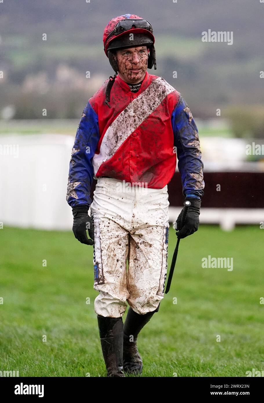 Jockey Patrick King walks back after falling from Angels Dawn after the ...