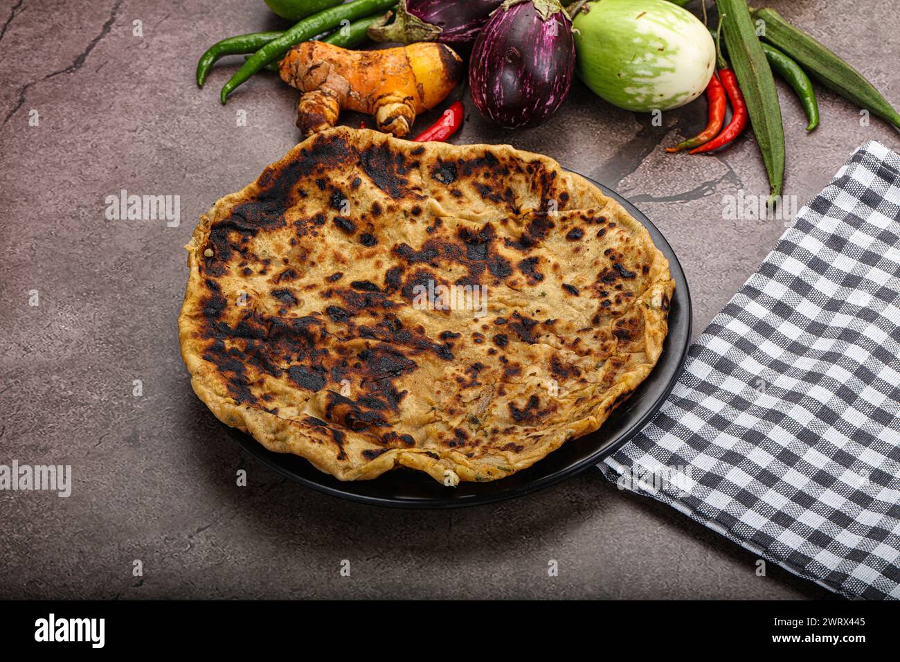 Indian cuisine stuffed Aloo paratha bread with potato Stock Photo Alamy