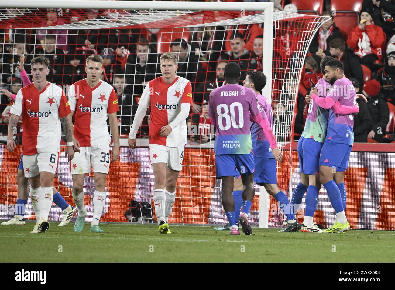 Prague, Czech Republic. 14th Mar, 2024. AC Milan soccer players, right, celebrate a goal in action during the Slavia Praha vs AC Milan football return match of the Europa League semi-final on March 14, 2024, Prague, Czech Republic. Credit: Katerina Sulova/CTK Photo/Alamy Live News Stock Photo