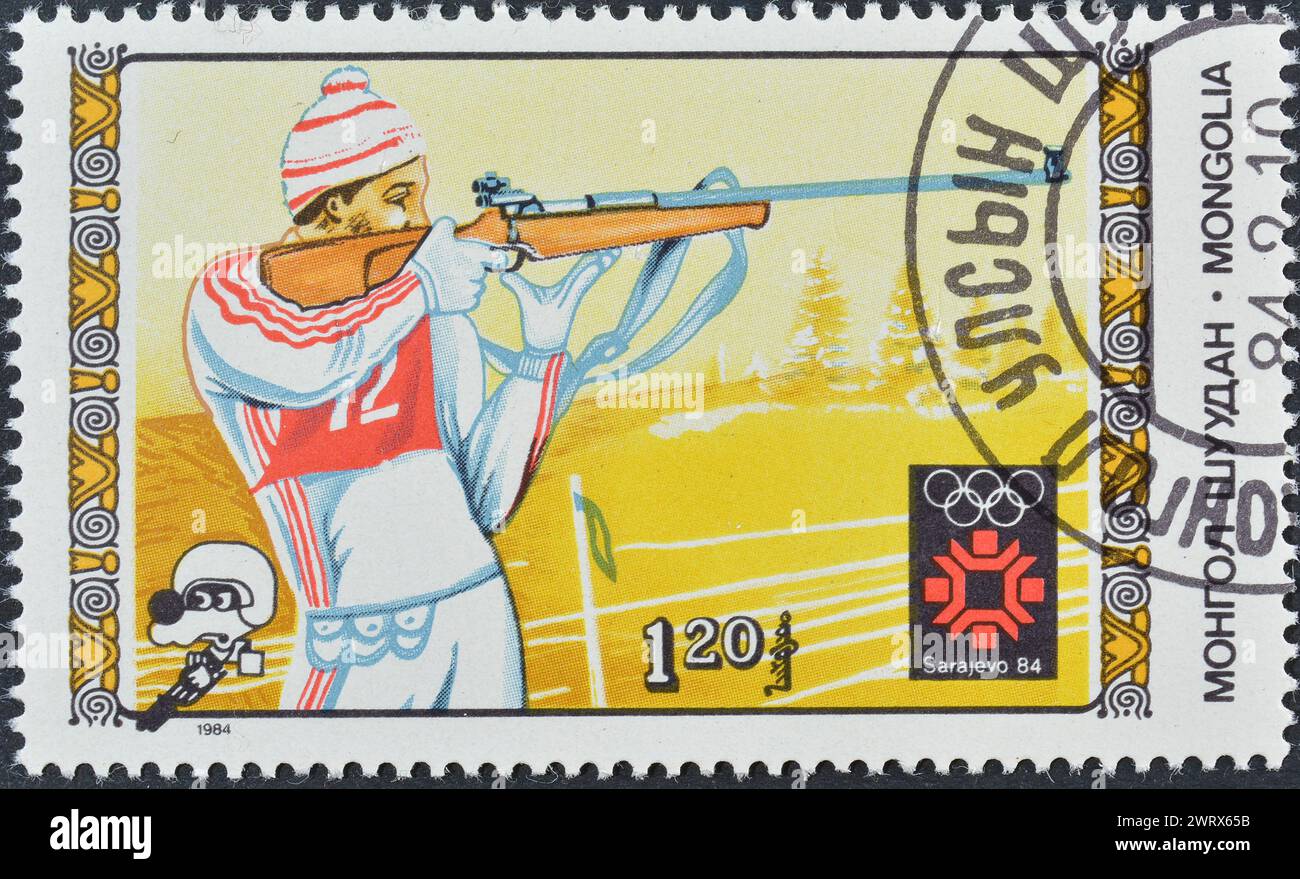 Cancelled postage stamp printed by Mongolia, that shows Biathlon, Winter Olympic Games 1984 - Sarajevo, circa 1984. Stock Photo