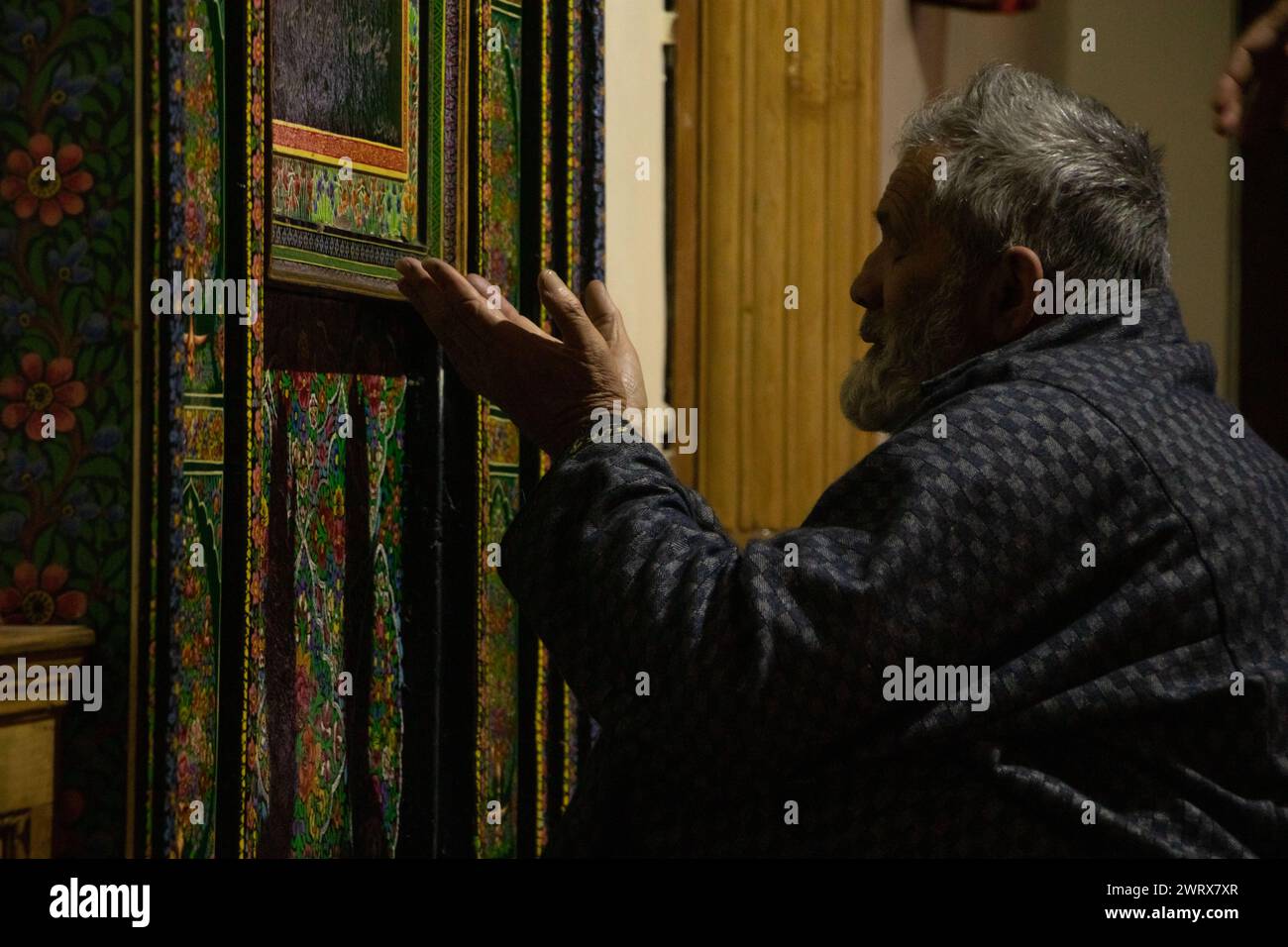 Srinagar, Kashmir, India. 14th Mar, 2024. A Kashmiri Muslim is praying ...