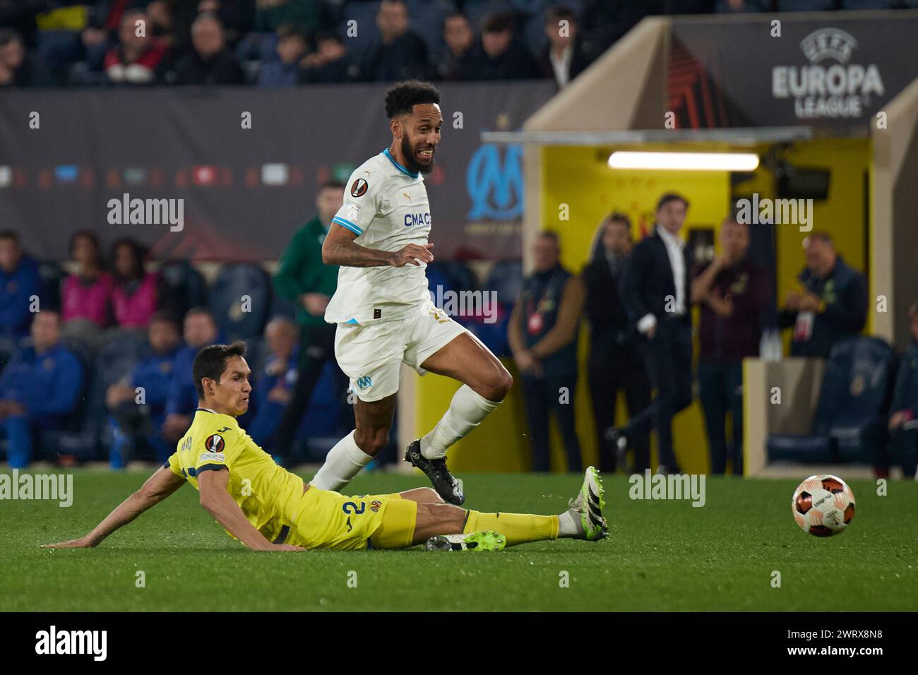 VILLARREAL, SPAIN - MARCH 14: Aissa Mandi of Villarreal CF competes for the ball with Pierre-Emerick Aubameyang Centre-Forward of Olympique Marseille during to the UEFA Europa League 2023/24 round of 16 second leg match between Villarreal CF and Olympique Marseille at Estadio de la Ceramica on March 14, 2024 in Villarreal, Spain. (Photo By Jose Torres/Photo Players Images) Stock Photo