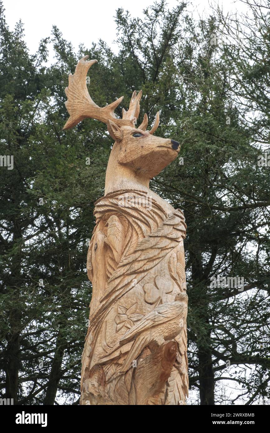 Around Cirencester a small Gloucestershire town. King Charles III Coronation Carving in Cirencester Park Stock Photo