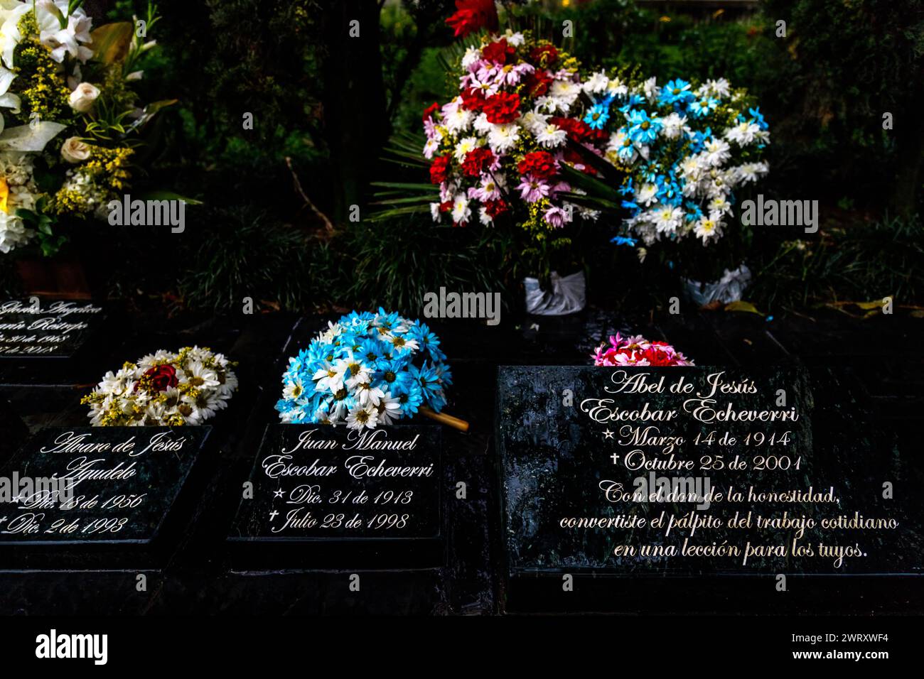 Medellin, Colombia - January 11, 2023: Tombs of Pablo Escobar Gaviria's family with floral offerings Stock Photo