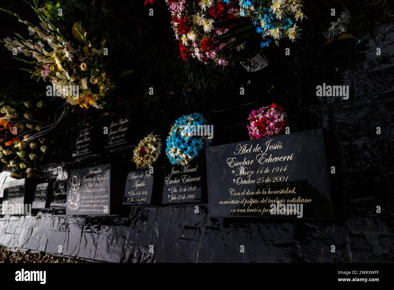 Medellin, Colombia - January 11, 2023: Graves of Pablo Escobar Gaviria's family with the tombstone of his father, Abel de Jesus, in the foreground Stock Photo