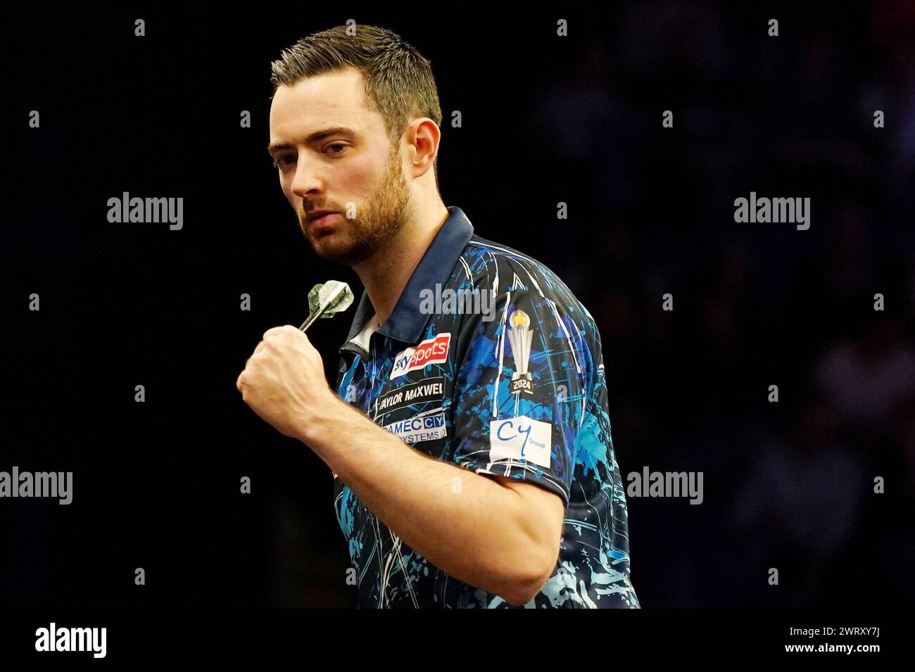 Luke Humphries celebrates victory over Peter Wright (not pictured) on night seven of the 2024