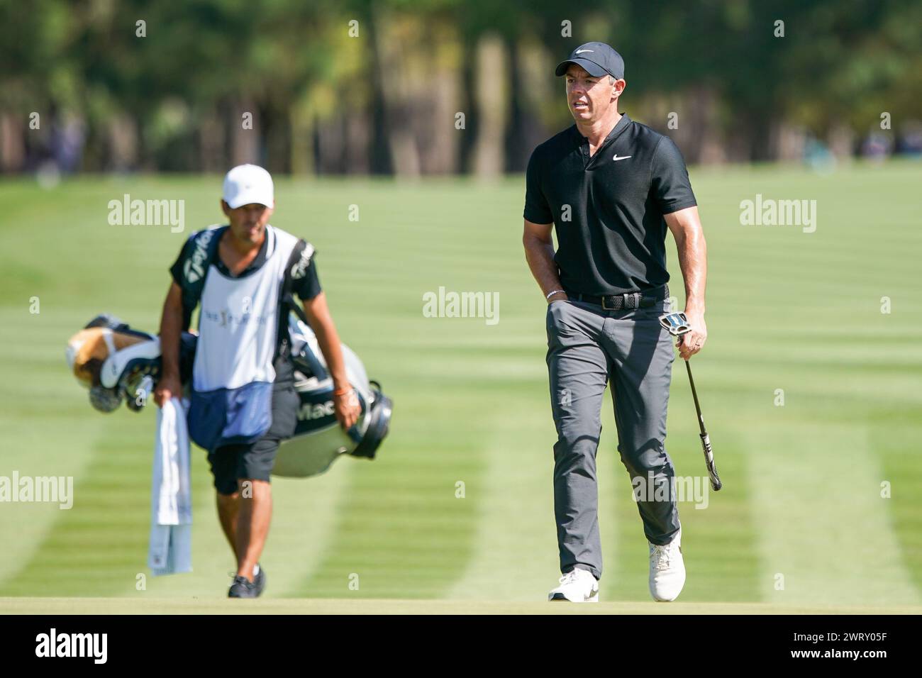 Ponte Vedra Beach, Florida, USA. 14th Mar, 2024. Rory McIlroy (R) and